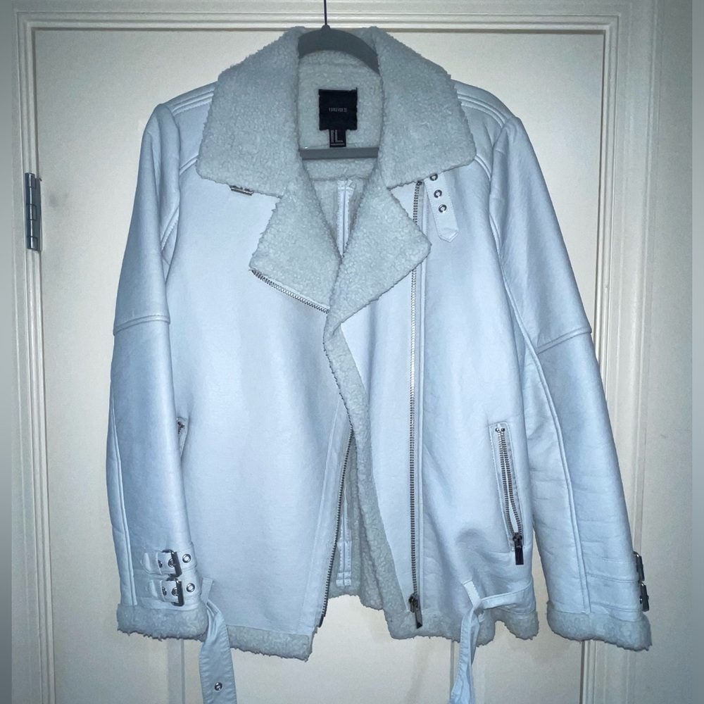 GORGEOUS Cinderella Blue vegan leather moto jacket with sherpa lining.